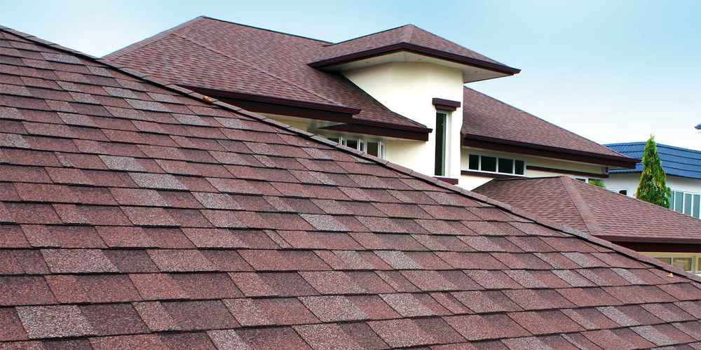 Roof made of reddish brown apshalt shingles