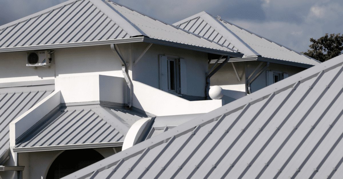 Gray metal roofs on several different houses